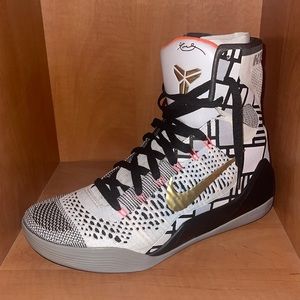 White Kobe Bryant shoes. Size US 8, UK 7.